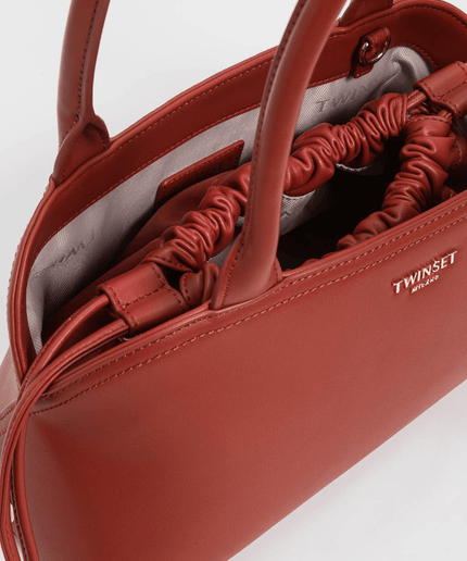Borsa bauletto con pochette stampata - Piedi Folli