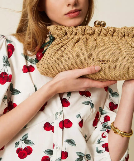 Borsa clutch in rafia con charm - Piedi Folli