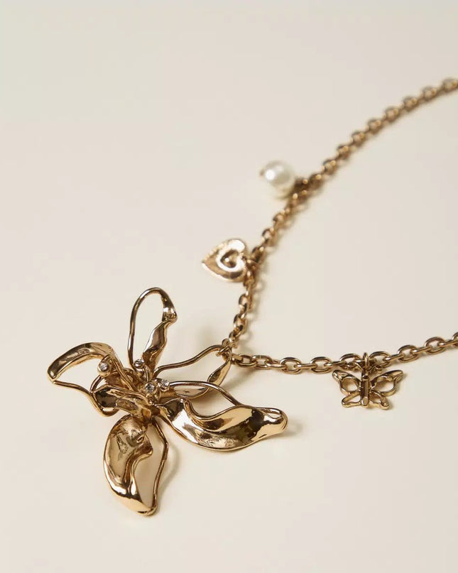 Collana con maxi fiore e pendenti - Piedi Folli