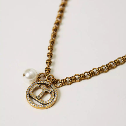 Collana con pendente Oval T - Piedi Folli